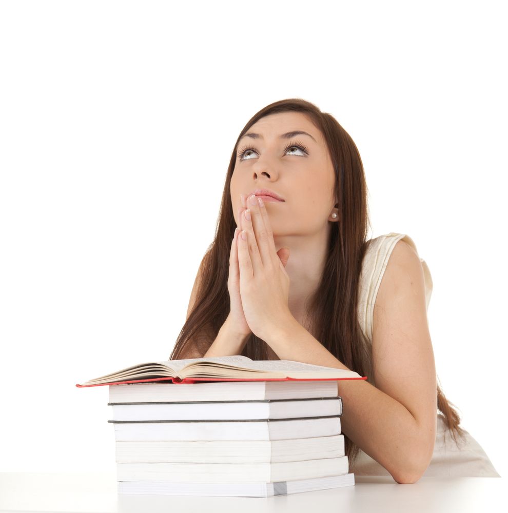Praying,Student,Girl,With,Books,,White,Background