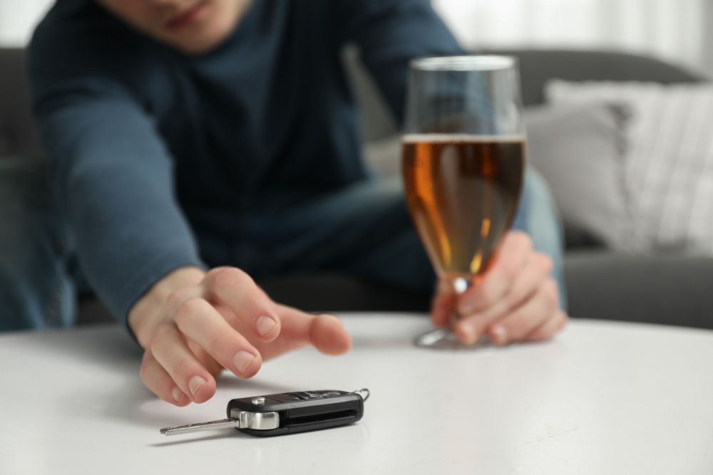 Drunk,Man,Reaching,For,Car,Keys,Indoors,,Closeup.,Don't,Drink