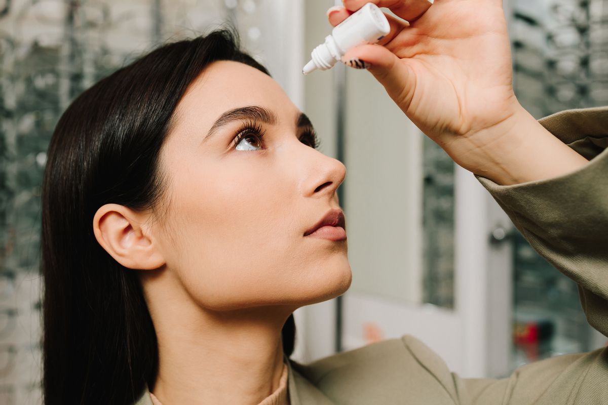 Applying,Eye,Drops,To,Woman,Patient,For,Eyes,Treatment,By