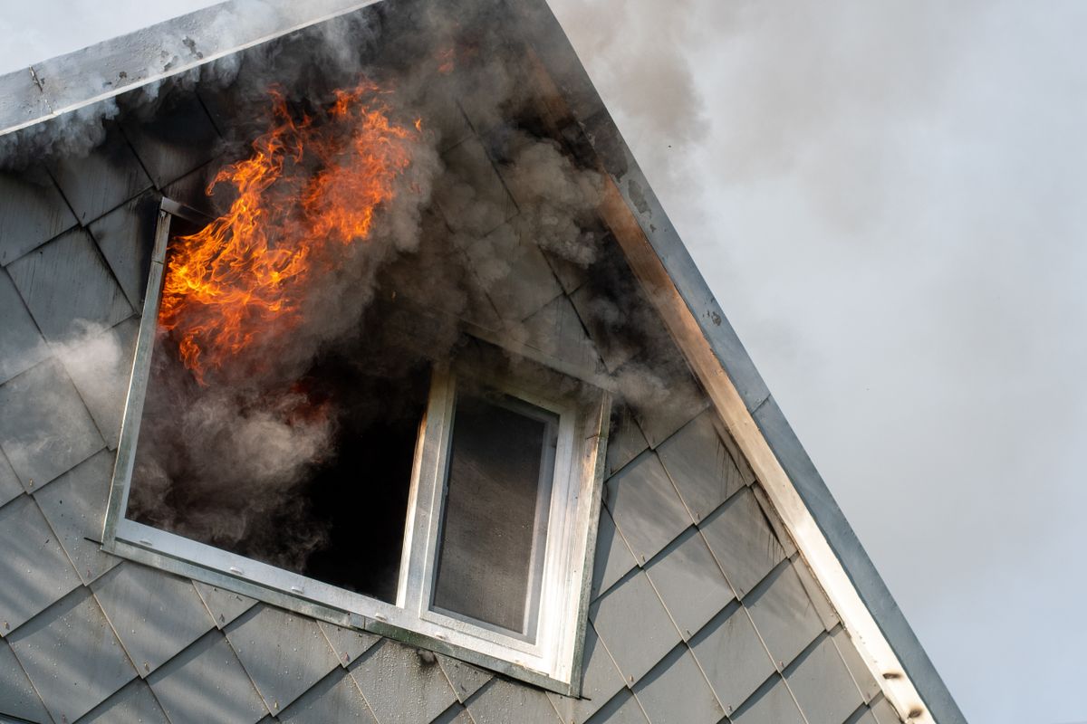 Flames,And,Smoke,Coming,Out,Of,The,Window,Of,A